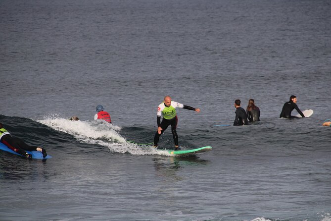 2 hours Semi-private surfing lesson in Playa de Las Americas - From shore-based theory to the first attempt