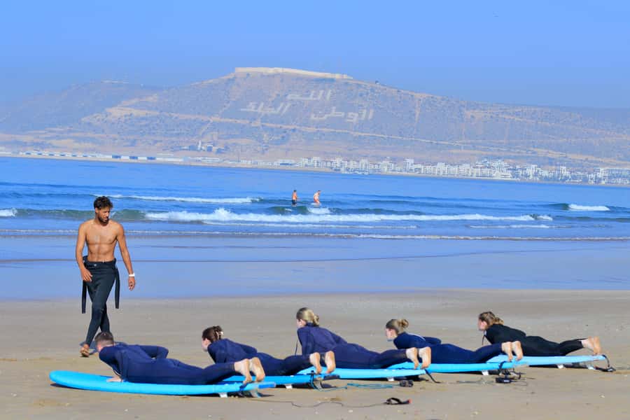 Agadir: 2h Surf Lesson with Local Instructors - Sand practice: learning to stand before the waves arrive