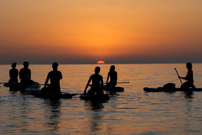 Barcelona: Sunrise Paddle Surf with Instructor and Photos - Safety briefing and first paddle strokes
