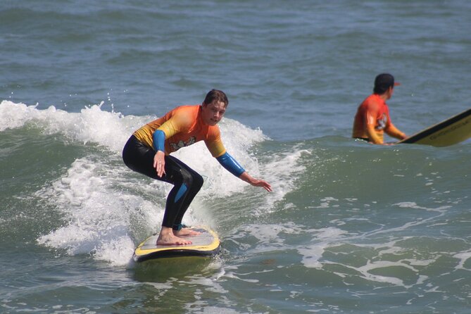 Beginner Surf Lesson in Lima, Perú - The board, wetsuit, and beach setup