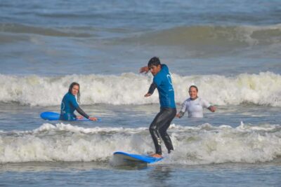 Learn to surf with the best view of Table Mountain