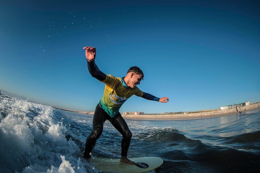 Costa da Caparica: Sunset Surf Lesson - Getting fitted with a board and wetsuit