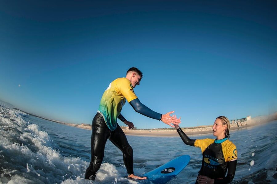 Costa da Caparica: Sunset Surf Lesson - Booking, cancellation, and practical planning