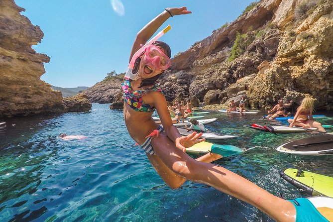 Discover the best corners of the island in paddle surf - Swimming, going underwater, and cliff jumps