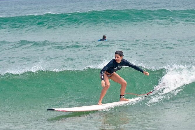 Experience The Thrill Half Day Surf School in Byron Bay - Getting fitted out with the right equipment
