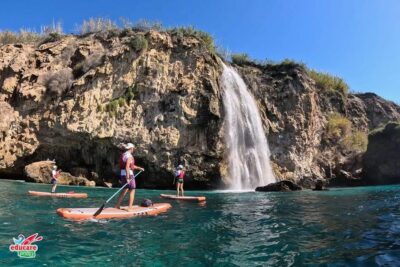 Guided Paddle Surf Cliffs and Maro Waterfall