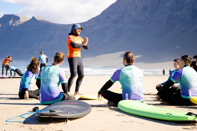 Full Day Surf Lesson for Beginners in Famara, Spain - In the water: paddling, balance, and first waves