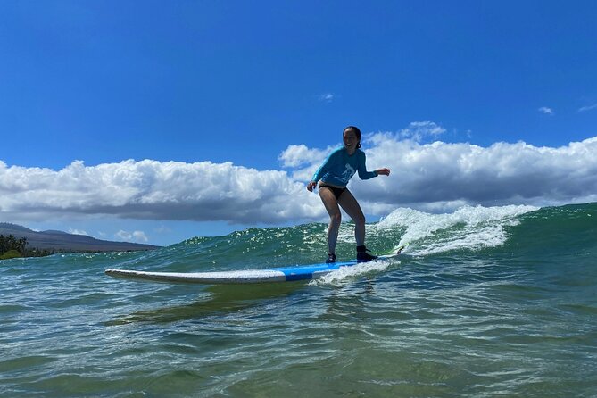 Group Surf Lesson at Kalama Beach in Kihei - Catching your first waves in warm Maui water