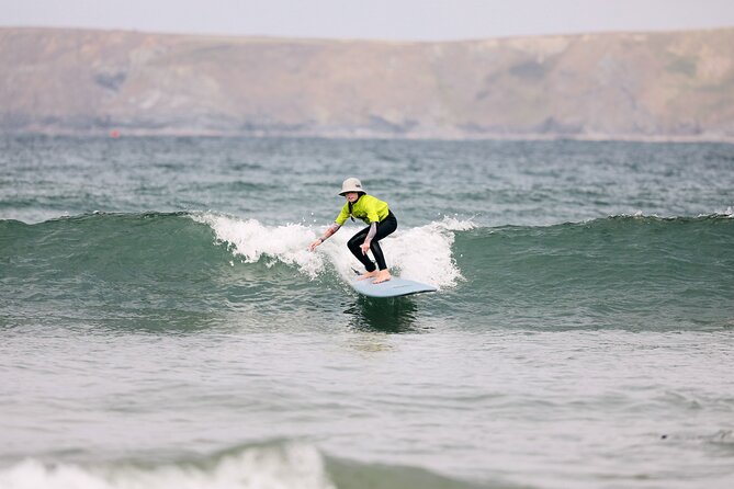 Half-Day (2hr) Surf Experience in Newquay - Beginners & Improvers - Catching waves at Newquay Beach