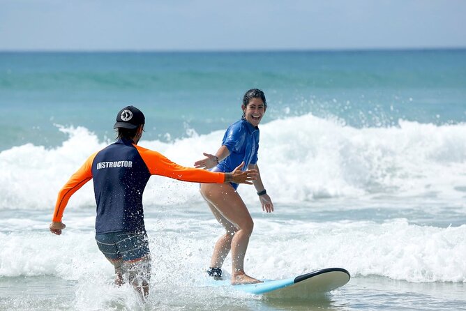 Half Day Guided Surf Lesson in Byron Bay - Getting fitted with gear before the lesson