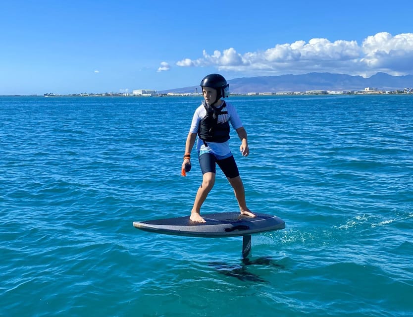 Hawaii: Electric Hydrofoil Surfing Solo Lesson - Why the Radio Helmet Helps