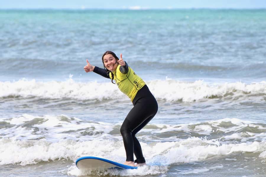 Jeffreys Bay: Learn to Surf Group Lesson - Returning to Shore for the Stand-Up Technique