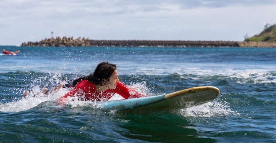 Kalapaki Beach: Surfing Lesson with Kauai Beach Boys - Paddling, balance, and the first attempt