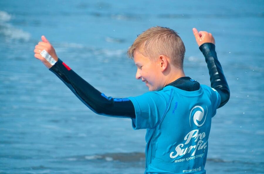Las Palmas: Learn to Surf with a Special Price for Two Group - What the insurance and optional media add