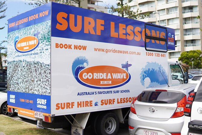 Learn to Surf at Coolangatta on the Gold Coast - Learning to stand on a soft beginner board