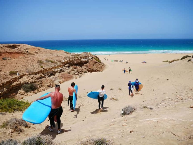 Learn to Surf in the north of Fuerteventura! - Warm-up, sand lesson, then your first attempt