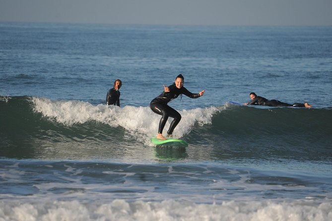 Learn to Surf with a Local - One Day Surf Experience - A beach picnic with seasonal fruit