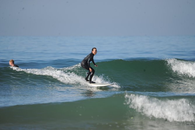Learn to Surf with a Local - One Day Surf Experience - The first 2.5 hours: warm-up, theory, and waves