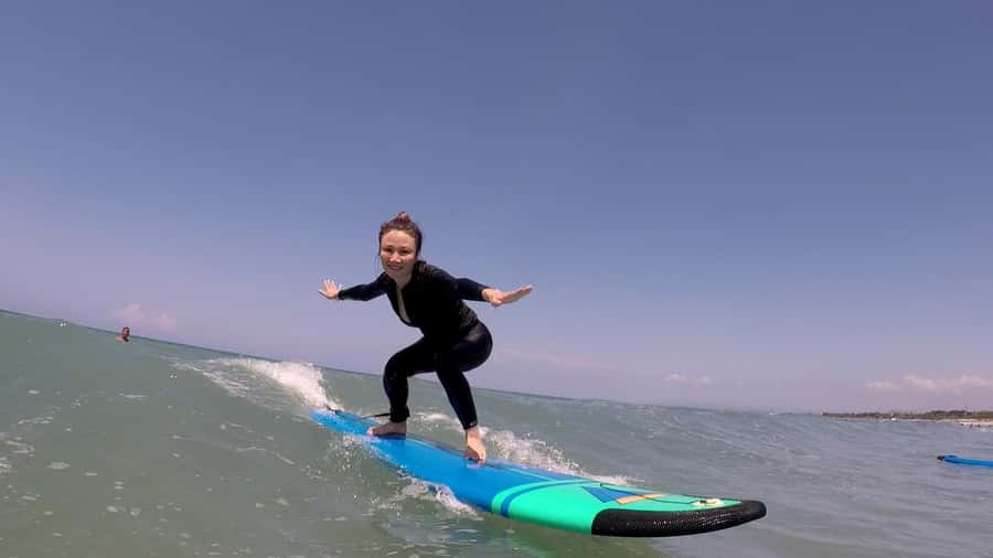 Legian Beach, Bali: Beginner or Intermediate Surf Lessons - Into the water: learning to catch a wave