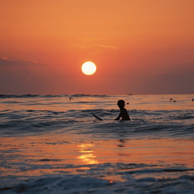 Lisbon: Sunset Surf Experience - Getting fitted with the surf gear