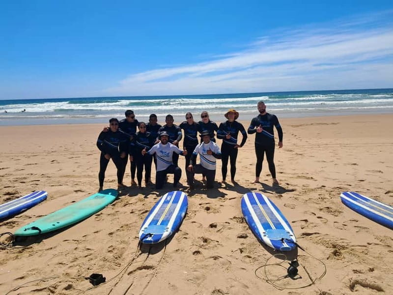 Lisbon: Surfing Lesson on Costa de Caparica Beach - Getting suited up and learning on the sand