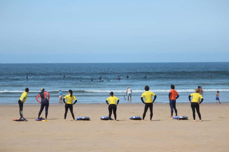 Lisbon: Surfing Lesson on Costa de Caparica Beach - Stretching, snacks, and the human touch