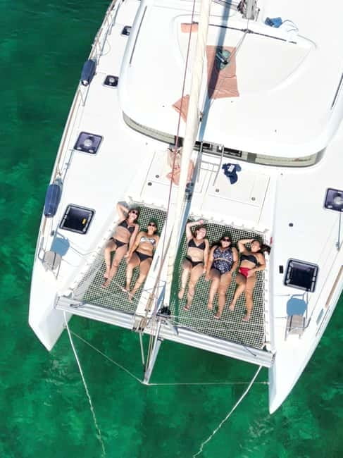 Majorca: Dinner aboard a private catamaran with snorkeling and paddle surfing - Key points at a glance