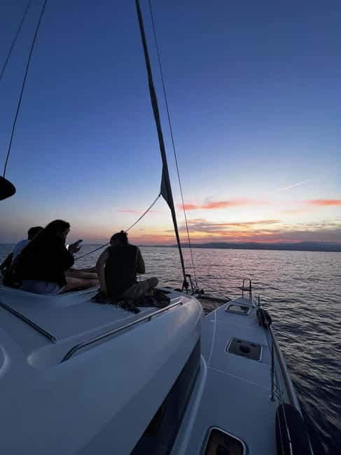 Majorca: Dinner aboard a private catamaran with snorkeling and paddle surfing - Who will enjoy this Palma sailing