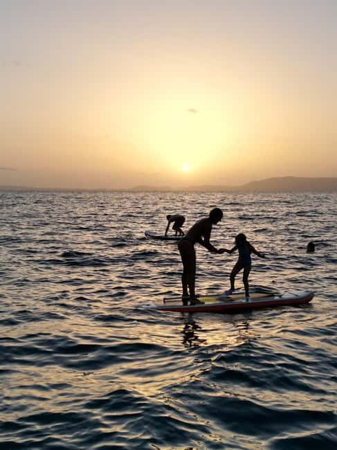 Majorca: Dinner aboard a private catamaran with snorkeling and paddle surfing - An active hour in a clear-water cove