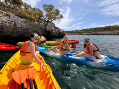 Kayak and Paddle Surf excursion through crystal clear water caves