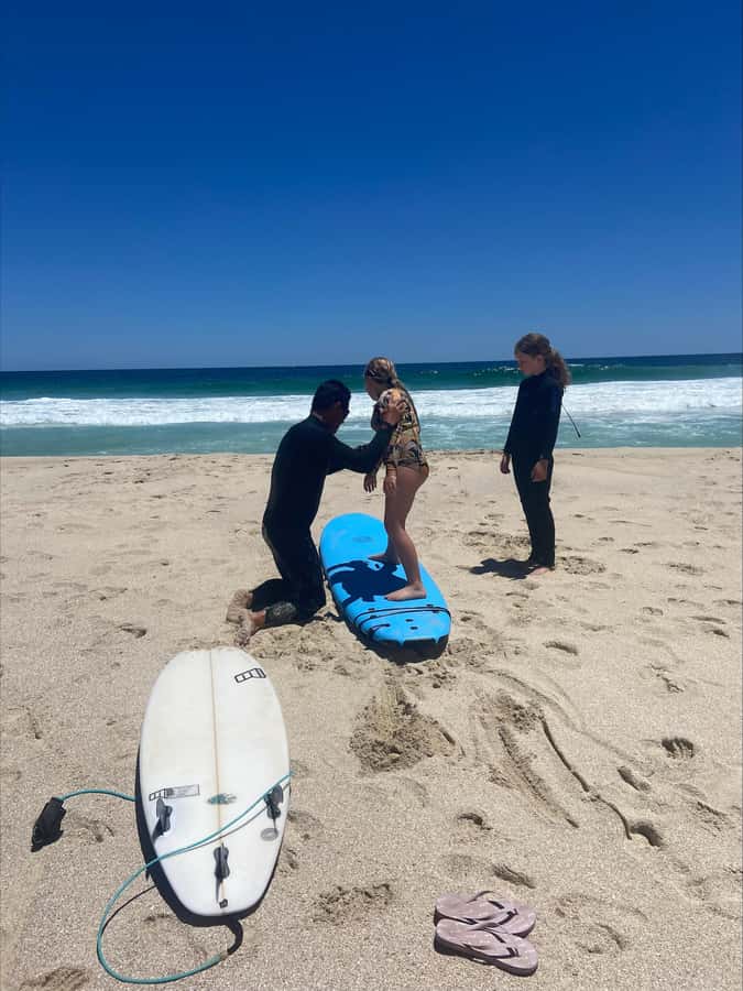 Margaret River Surfing Academy - Group surfing lesson - Getting fitted with the board and wetsuit