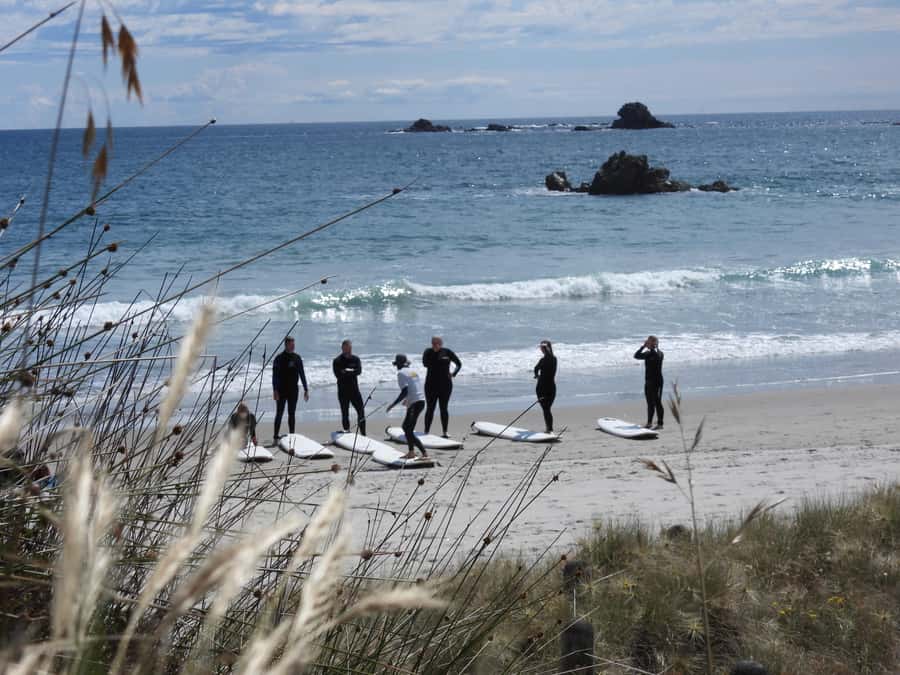 Mount Maunganui: Group Beginner Surf Lesson - The first lesson on land: safety, gear, and surf etiquette