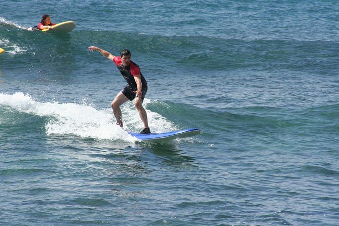 Po'ipu Surf Lesson - Moving into the water at Poipu
