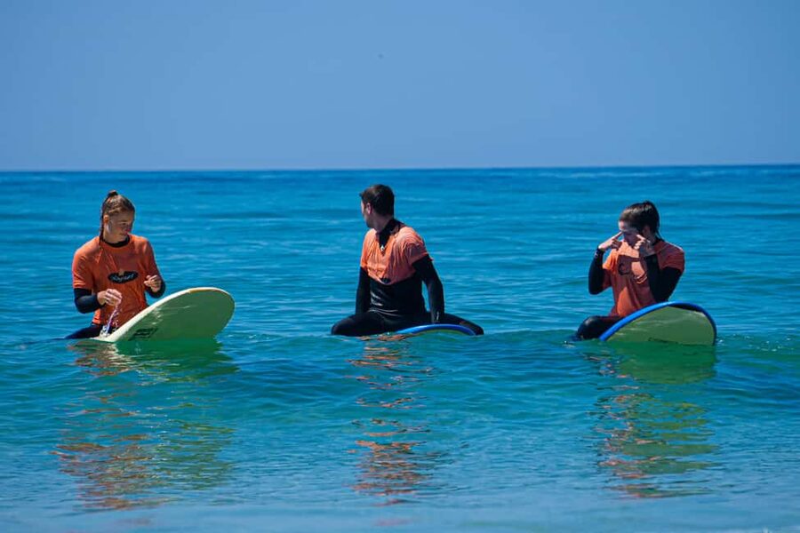 Praia da Rocha Surf Lesson - Starting with a warm-up at Praia da Rocha