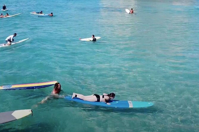 Private Surfing Lessons in Waikiki - Walking to the beach with your board