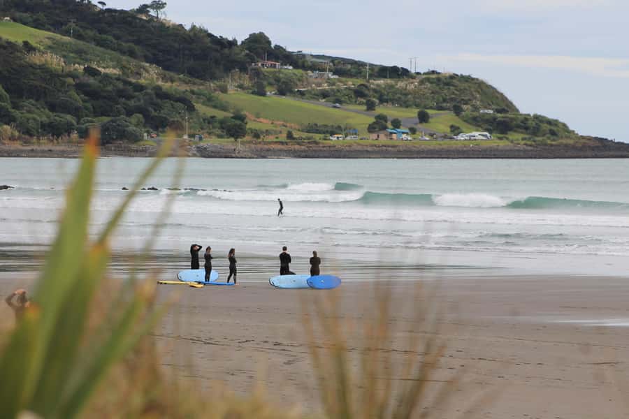 Raglan: Group Surf Lesson - Paddling, standing, and catching your first wave