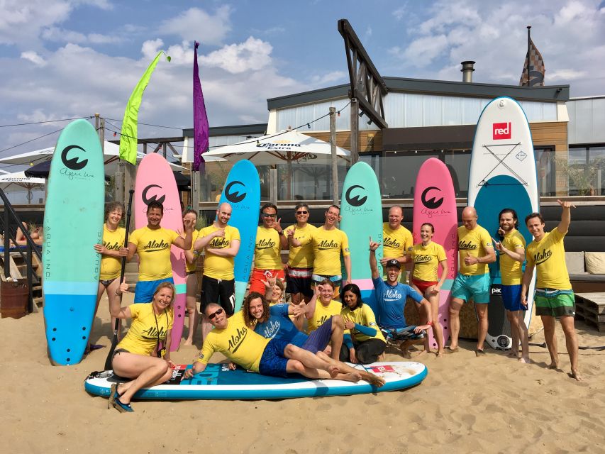 Scheveningen Beach: 1,5-Hour Surf Experience for Adults - Arriving at the blue building with the Aloha Flag