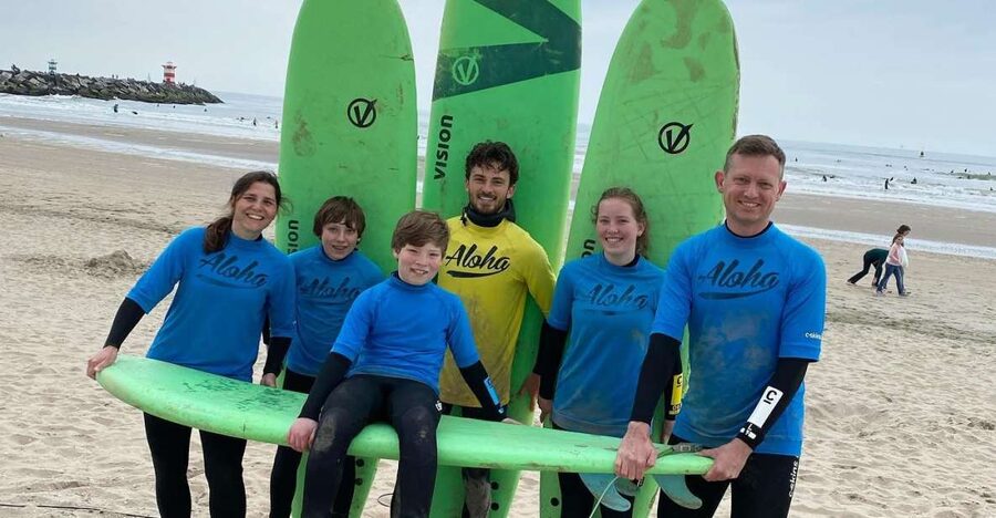 Scheveningen Beach: 1,5 hour Surf experience for families - The first lesson: safety, balance, and board basics