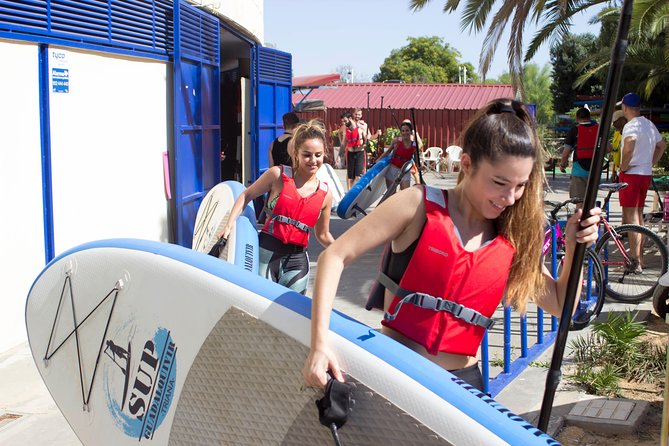 Seville Paddle Surf Sup in the Guadalquivir River - Paddling past Triana and the drink stop