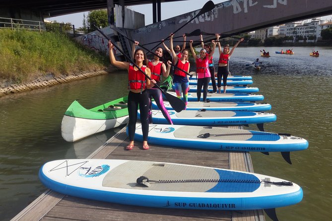 Seville Paddle Surf Sup in the Guadalquivir River - Passing the bullring and the Puente de Triana