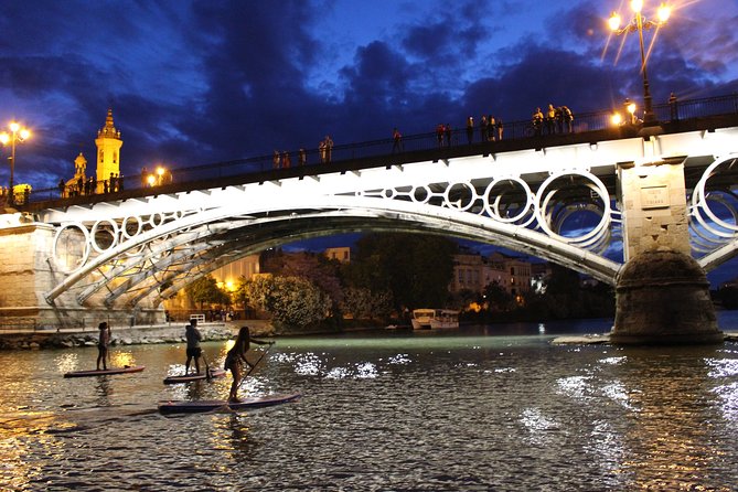 Seville: Sunset in Paddle Surf - San Telmo Bridge and the rhythm of the river