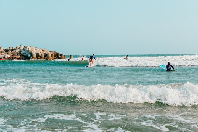 Surf in Vietnam with a local! - Heading into the water