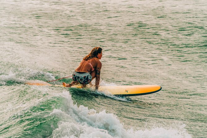 Surf in Vietnam with a local! - Local instruction with Pho and Sara