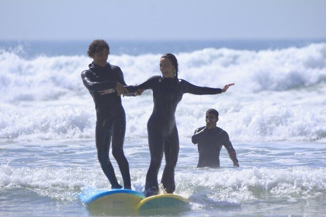 Surf Lessons in Taghazout Ride the Waves with Expert Instructors - Warm-up and stretching before you paddle out
