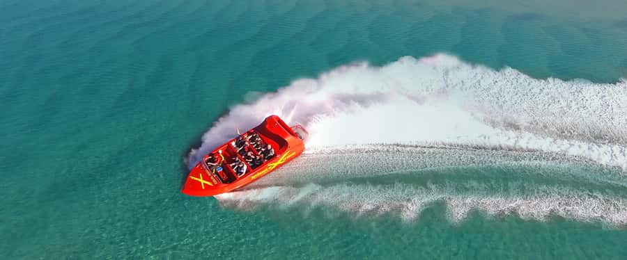 Surfer's Paradise: Jetboat Ride and Surf Lesson - Who gets the best value from $116