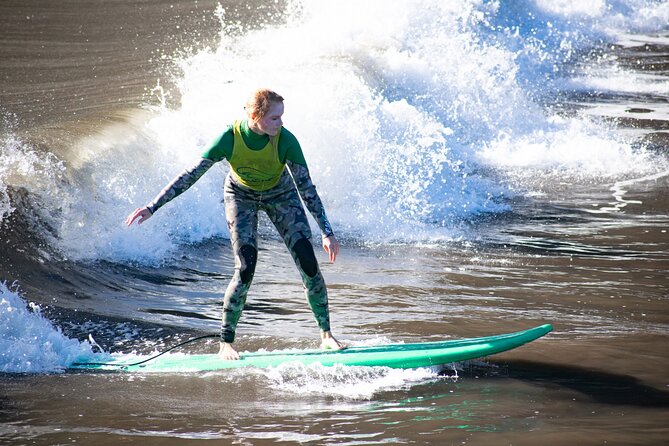 Surfing Lessons in Madeira - Paddling, catching waves, and standing up
