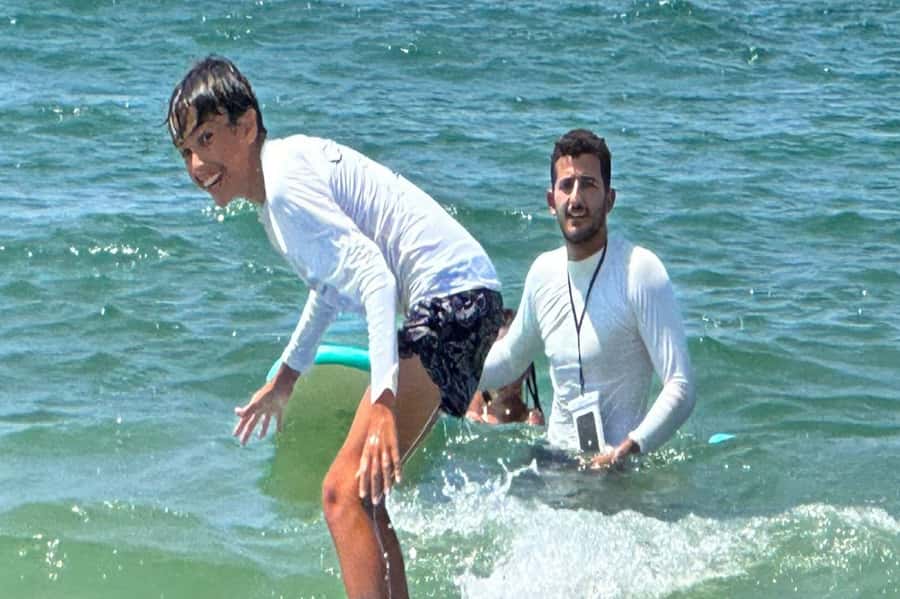 Tel Aviv: Professional Surfing Lessons at Beach Club TLV - Showers, changing rooms, and the beach club setting