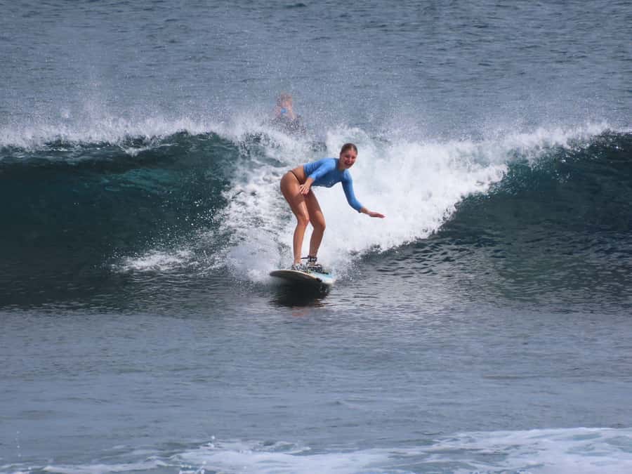 Uluwatu: Private Surf Lesson with Surf Photos & Videos - Getting into the water with one instructor for two